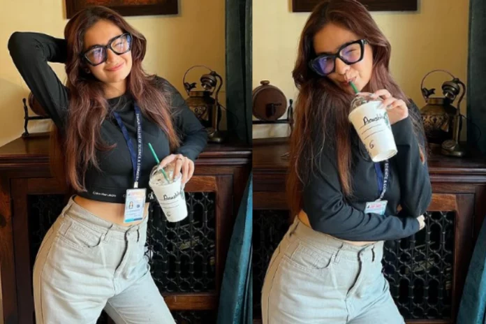 Anushka Sen is seen wearing a black crop top and off white jeans