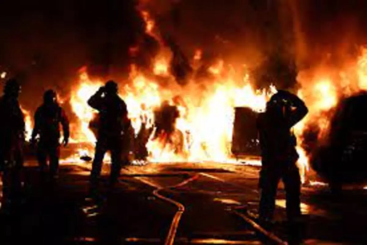 parish Paris French police and protesters battled in Paris and other cities after a North African driver was shot dead at a traffic stop.