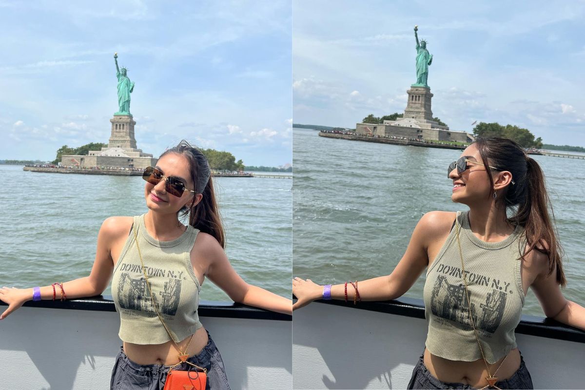 Anh Duong poses in front of Statue if Liberty as she attends the... News  Photo - Getty Images