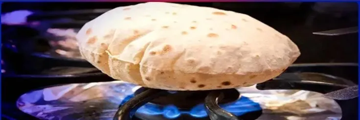 Cooking Roti on Flames