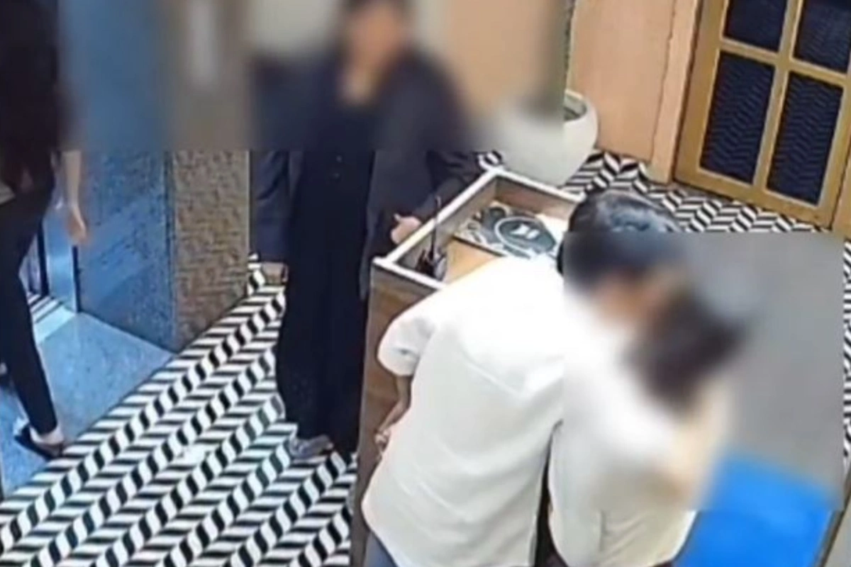 Jhansi Viral Video Businessman's Son kisses hotel receptionist Jhansi Viral Video Businessman's Son kisses hotel receptionist